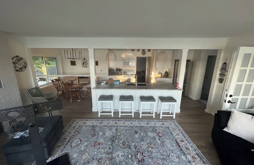Wolf Lake House | Eagles Nest - Lake front escape with water and sunset views plus a sandy beach