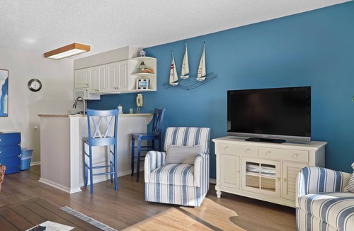 Charlevoix Condo | Edgewater Inn 117D | Waterfront Access | Pool, Hot Tub, Sauna