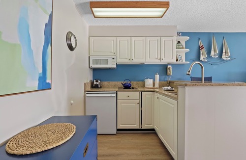 Charlevoix Condo | Edgewater Inn 117D | Waterfront Access | Pool, Hot Tub, Sauna