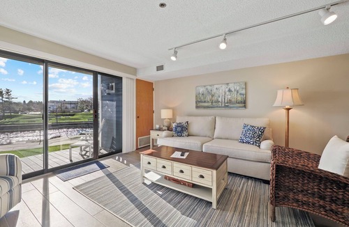 Charlevoix Condo | Edgewater Inn 117D | Waterfront Access | Pool, Hot Tub, Sauna