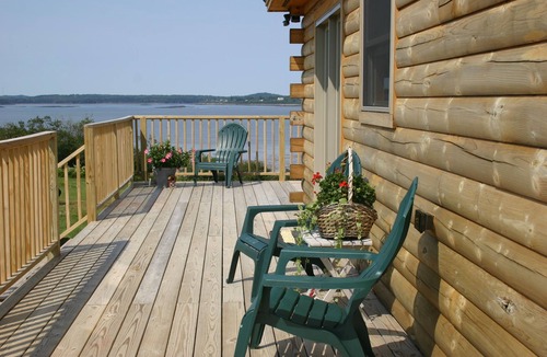 Cutler House | Elegant log home with unobstructed ocean views