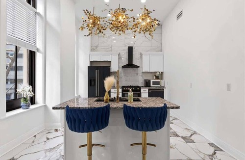 West Main Historic District Apartment | Exclusive Downtown retreat w/stunning city views!
