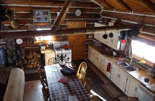 Perronville Cabin | Family friendly comfy log lodge and pond.