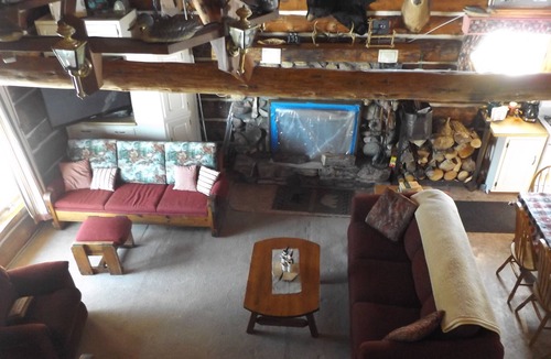 Perronville Cabin | Family friendly comfy log lodge and pond.