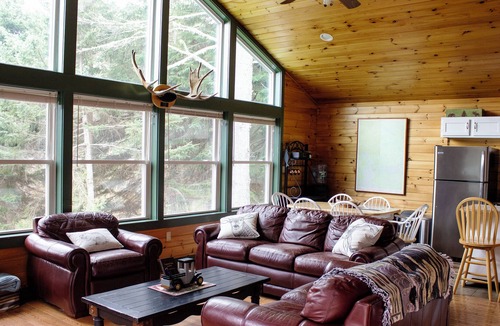 Oquossoc Cabin | Family & Pet Friendly - Rangeley Lake Water & Beach Access
