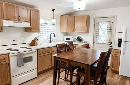 International Falls Cabin | Family-ready cabin with dedicated boat slip at walkable marina and beach access.