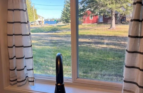 International Falls Cabin | Family-ready cabin with dedicated boat slip at walkable marina and beach access.