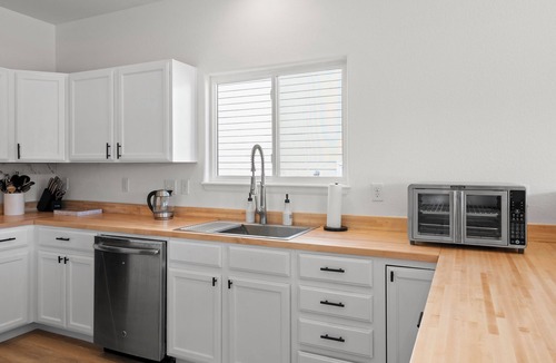 Security-Widefield House | Family-sized Japandi Retreat - 6BR & Hot Tub.