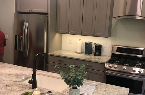 Traverse City Condo | Forest & Brook View Condo – Tranquil Porch, Minutes to TC Breweries & Cafés!