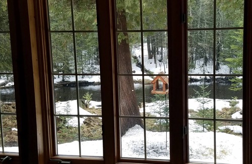 Luzerne Cabin | Gold Fox Lodge - Romantic Riverfront Log Cabin - A Piece of Michigan History!