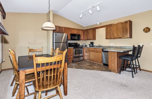 Eagle River Condo | Gorgeous Condo on Duck Lake with indoor pool and onsite volleball, tennis and fi