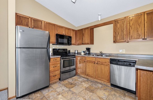 Eagle River Condo | Gorgeous Condo on Duck Lake with indoor pool and onsite volleball, tennis and fi