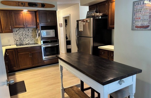 Empire House | Great Glen Arbor location! Private wooded setting, quick walk to town! Sleeps 9