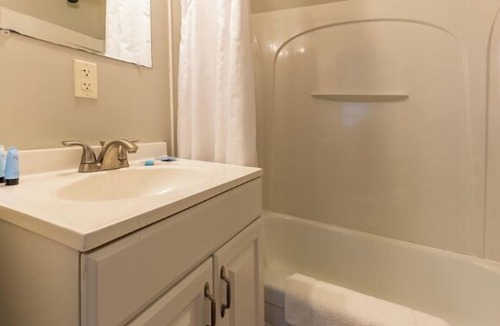 Whitehall Resort | Great room with two Full beds. Lake view from deck