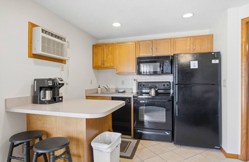 Mancelona Condo | Greens & Glides Getaway at Schuss Mountain