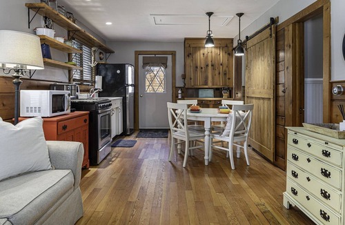 Indian River Cottage | Greet the morning sun with a view of the clear-flowing Indian River right outside the door