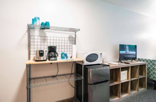Oscoda Apartment | Guest Room #12 New Beginnings