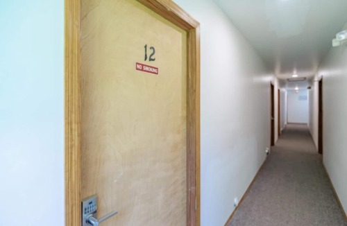 Oscoda Apartment | Guest Room #12 New Beginnings