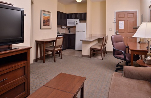 Central Oklahoma City Condo | Heated Saltwater Pool. Free Breakfast Buffet Daily.