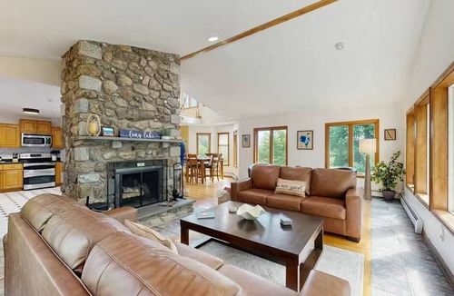 Naples House | Hilltop Family Escape | River Rock Fireplace