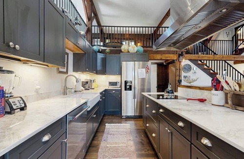 Wells House | Historic charmer with open interior, & large patio - dog-friendly