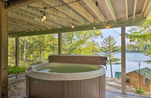 Lake Township Cabin | Hot Tub, Sauna, Fireplace, Dock! Lake Honor Cabin