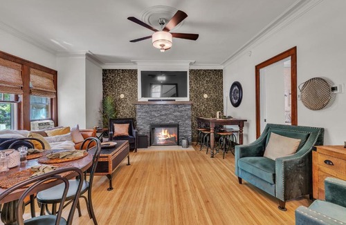 Burns Park House | Hot Tub Theater Sauna Deck Fire Pit Walk to StadiumDowntownPark