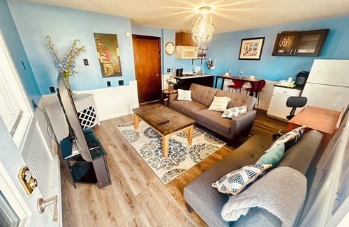 Biddeford Apartment | House dwelling that combines The bedroom kitchen and living area into one space