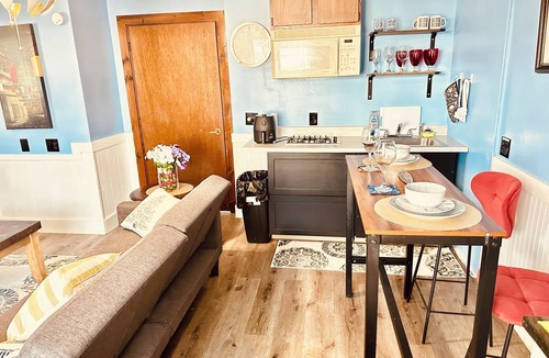 Biddeford Apartment | House dwelling that combines The bedroom kitchen and living area into one space