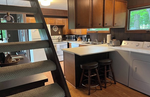 Kewadin House | Imogene's- Torch Lake cottage, waterfront w/dock