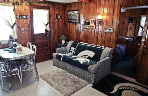 Carp Lake House | Incredible Cabin with Barbecue and Lake Access in Carp Lake, Michigan
