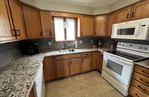 Lakeview House | Indian Lake Ohio Lakefront Cottage Dock · Fire Pit · Sleeps 8