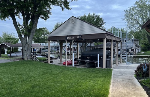 Lakeview House | Indian Lake Ohio Lakefront Cottage Dock · Fire Pit · Sleeps 8