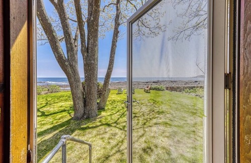 York Beach Cottage | Inviting oceanfront home with fireplace, firepit, & views from every room