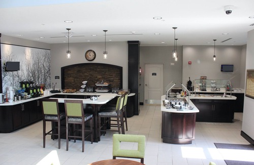 Miamisburg Condo | King Suite. Free Breakfast. Pool, Gym, Business Center.