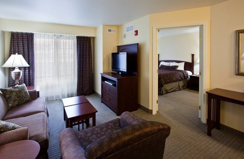 Okemos Condo | King Suite. Free Breakfast. Pool. Near Michigan State University.