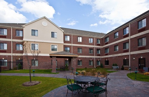 Okemos Condo | King Suite. Free Breakfast. Pool. Near Michigan State University.