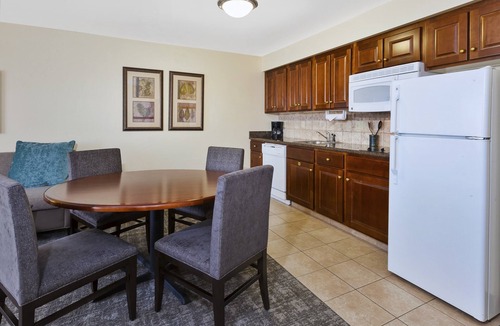 Okemos Condo | King Suite. Free Breakfast. Pool. Near Michigan State University.