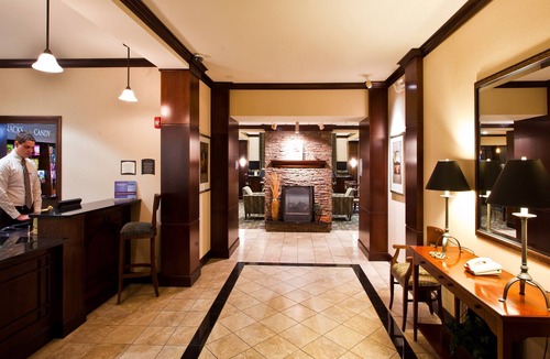 Okemos Condo | King Suite. Free Breakfast. Pool. Near Michigan State University.