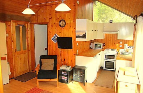 Taynuilt Cabin | KINGLAS CABIN is in a lovely, peaceful location deep in the forest, with hot tub