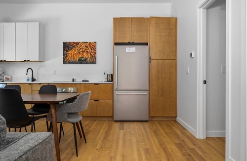 Acme Cabin | KOTI 1 (Two Bedroom) Traverse City's Scandinavian Cabins, vacation home on TART & mins to Traverse C.