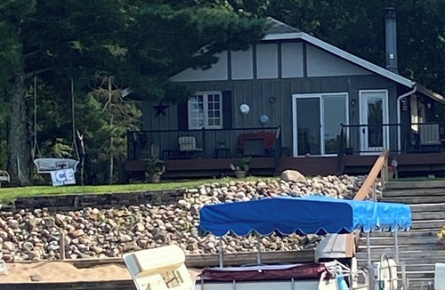 Nekoosa House | Lake Camelot, 4 bedroom, 2 baths, swimming, pier, fishing, fire pit, golf!
