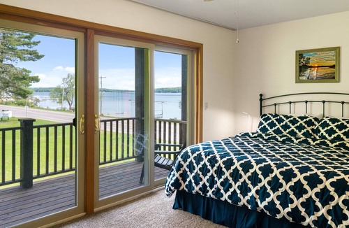 East Jordan Condo | Lake Charlevoix 2BR/3BA Townhome with Lake Views