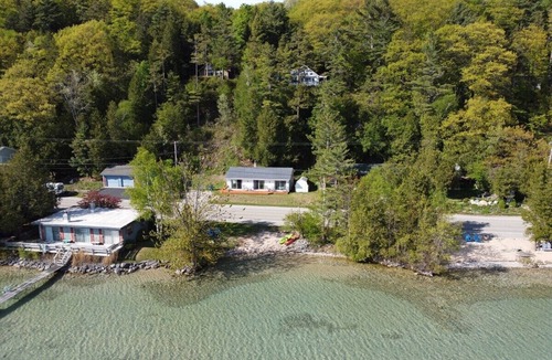 Lake Township Cottage | Lake Escape - PRIVATE LAKEFRONT WITH KAYAKS, DOCK, AND BEACH BONFIRE RING!