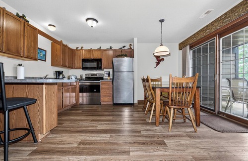 Eagle River Condo | Lake front 2-bedroom on the Eagle River Chain of Lakes with indoor pool and jacu
