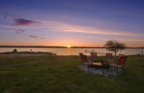 Traverse City Cottage | Lake Leelanau Cottage with Stunning Sun Set Views. 10 Miles from Traverse City!