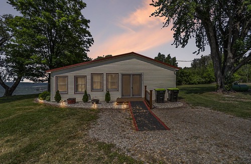 Traverse City Cottage | Lake Leelanau Cottage with Stunning Sun Set Views. 10 Miles from Traverse City!