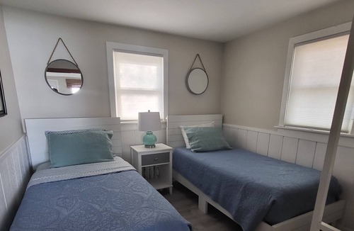 Traverse City Cottage | Lake Leelanau Waterfront Cottage with Mini Harbor - Close to Traverse City!