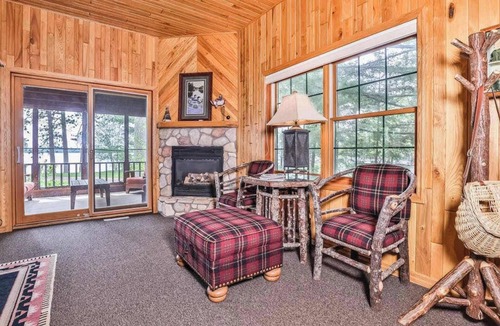 Manitowish Waters Condo | Lake resort villa with water views, screened porch & marina - dog-friendly