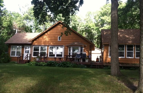 Darwin Cabin | Lake Stella beautiful beach and spacious deck on quiet private drive.